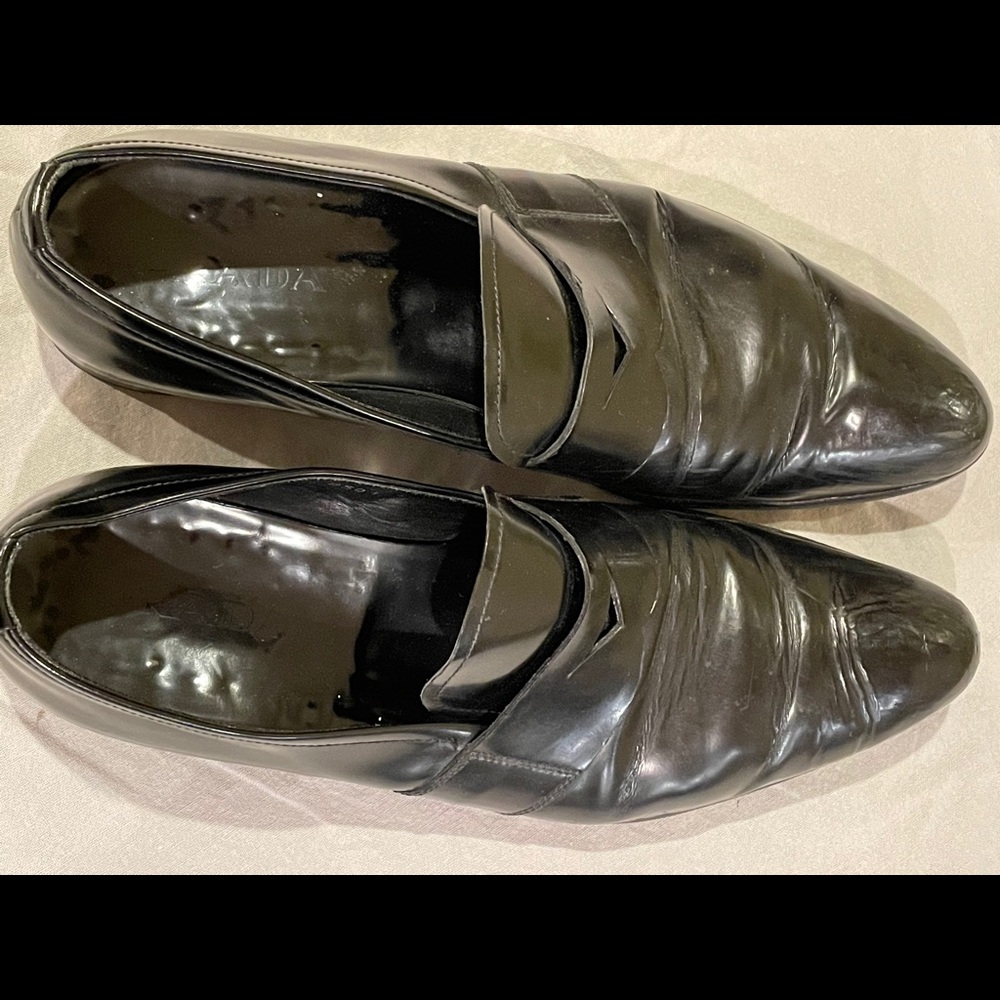 brown leather loafers by prada